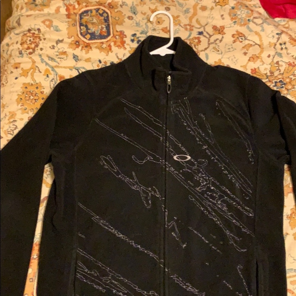 Black fleece Oakley jacket